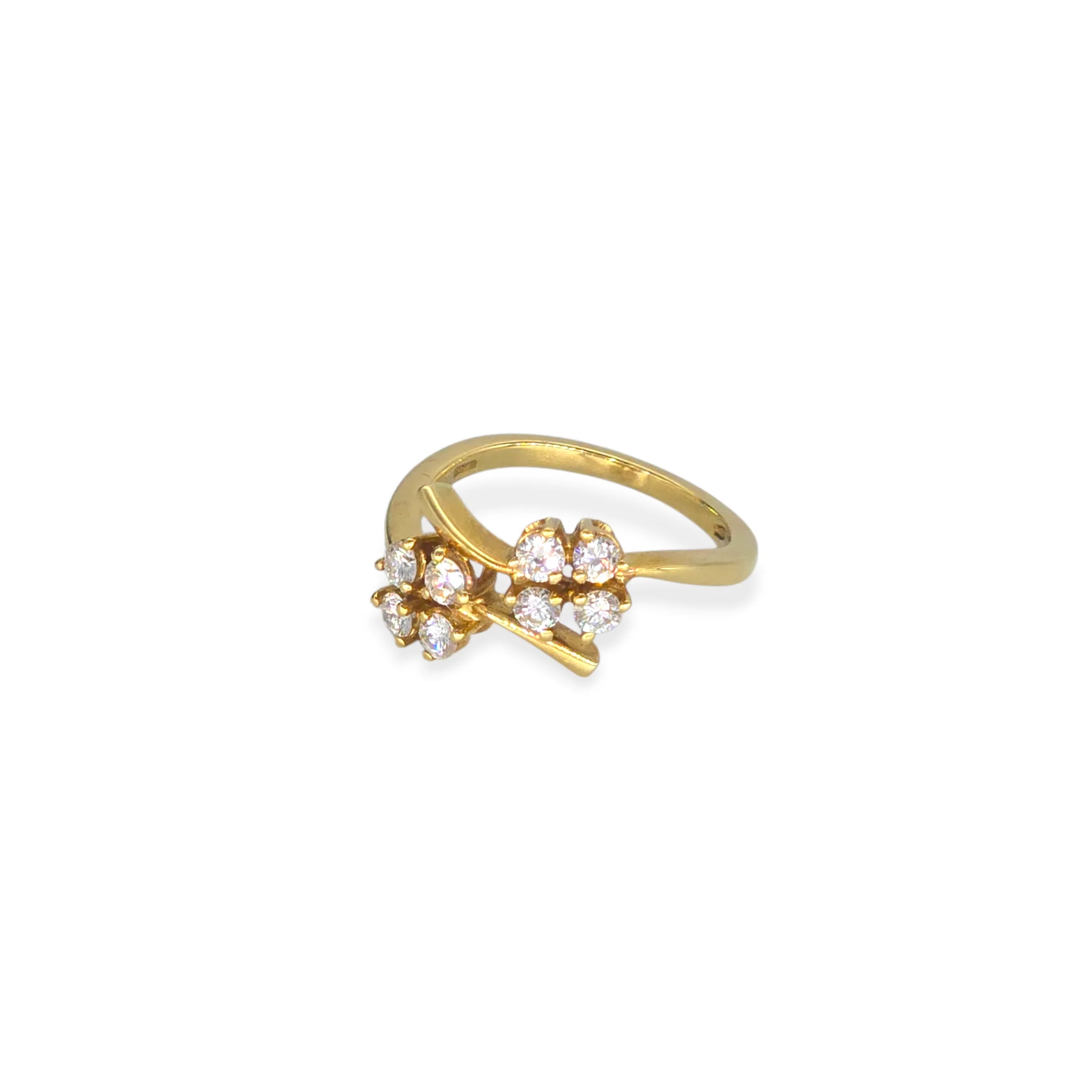 Anello a fiore in oro 18kt e zirconi bianchi