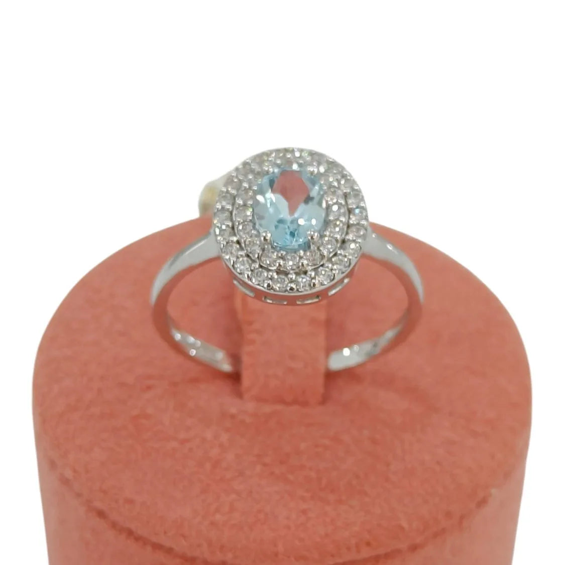 Damenring aus 9kt Weißgold mit zentralem blauem Stein und Zirkonen Igold