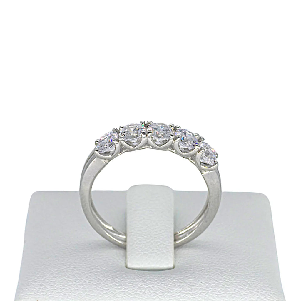Anello donna mezza veretta in oro bianco e zirconi bianchi