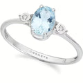 Anello in Oro bianco 375‰ con Diamanti bianchi e Acquamarina