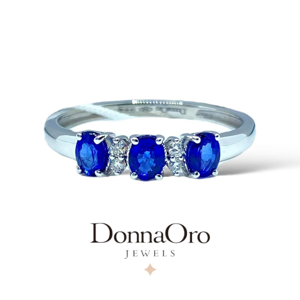 Trilogy-Ring aus Gold und Diamanten mit blauen Saphiren Kollektion Luce 150 Linie Iride – DonnaOro dhaz9619.004