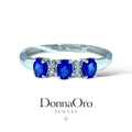 Trilogy-Ring aus Gold und Diamanten mit blauen Saphiren Kollektion Luce 150 Linie Iride – DonnaOro dhaz9619.004