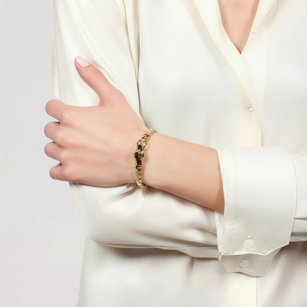 Bracciale con testa di serpente dorato Unoaerre 2851