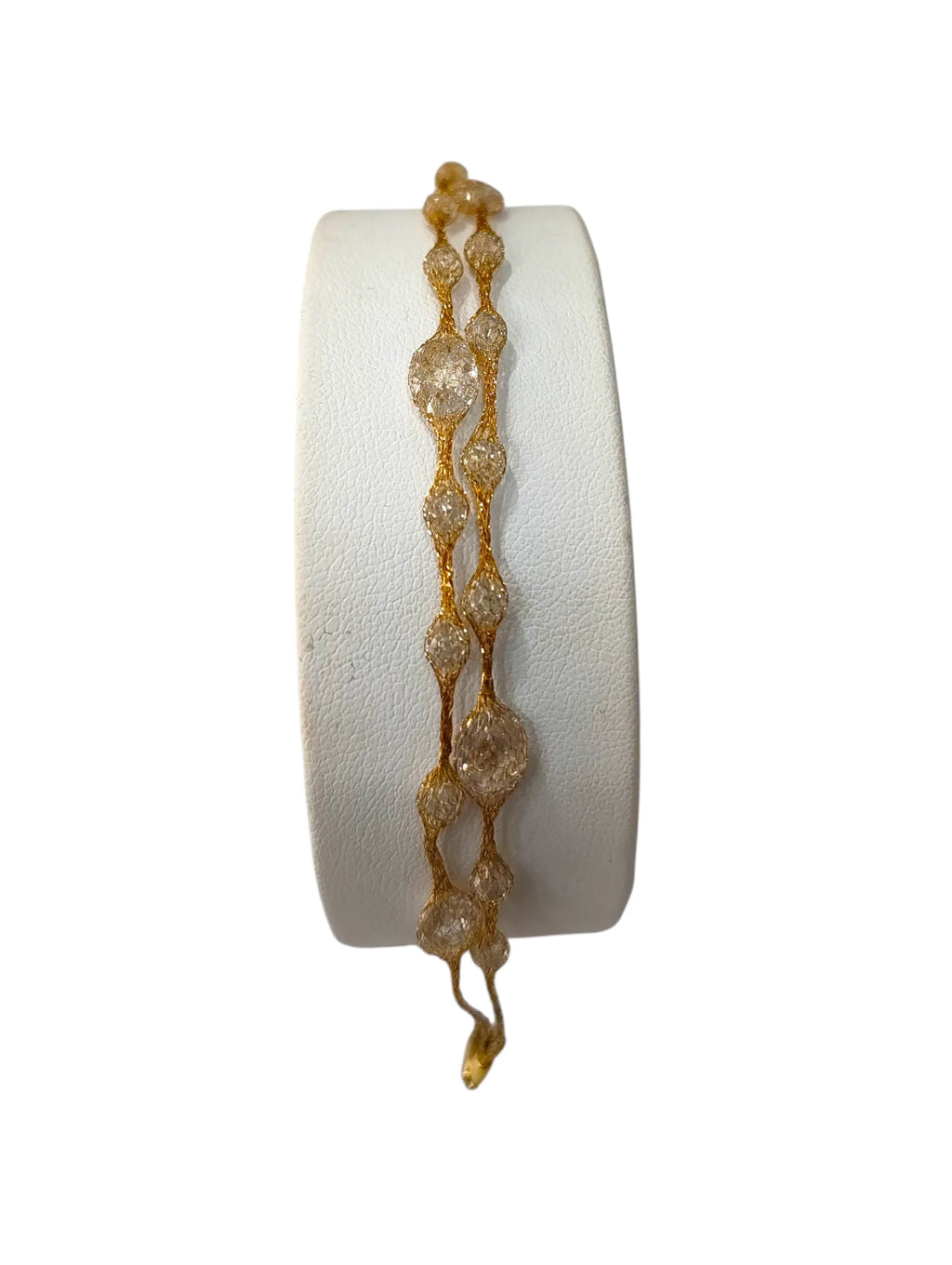 Bracciale donna in oro giallo 18kt effetto seta e pietre