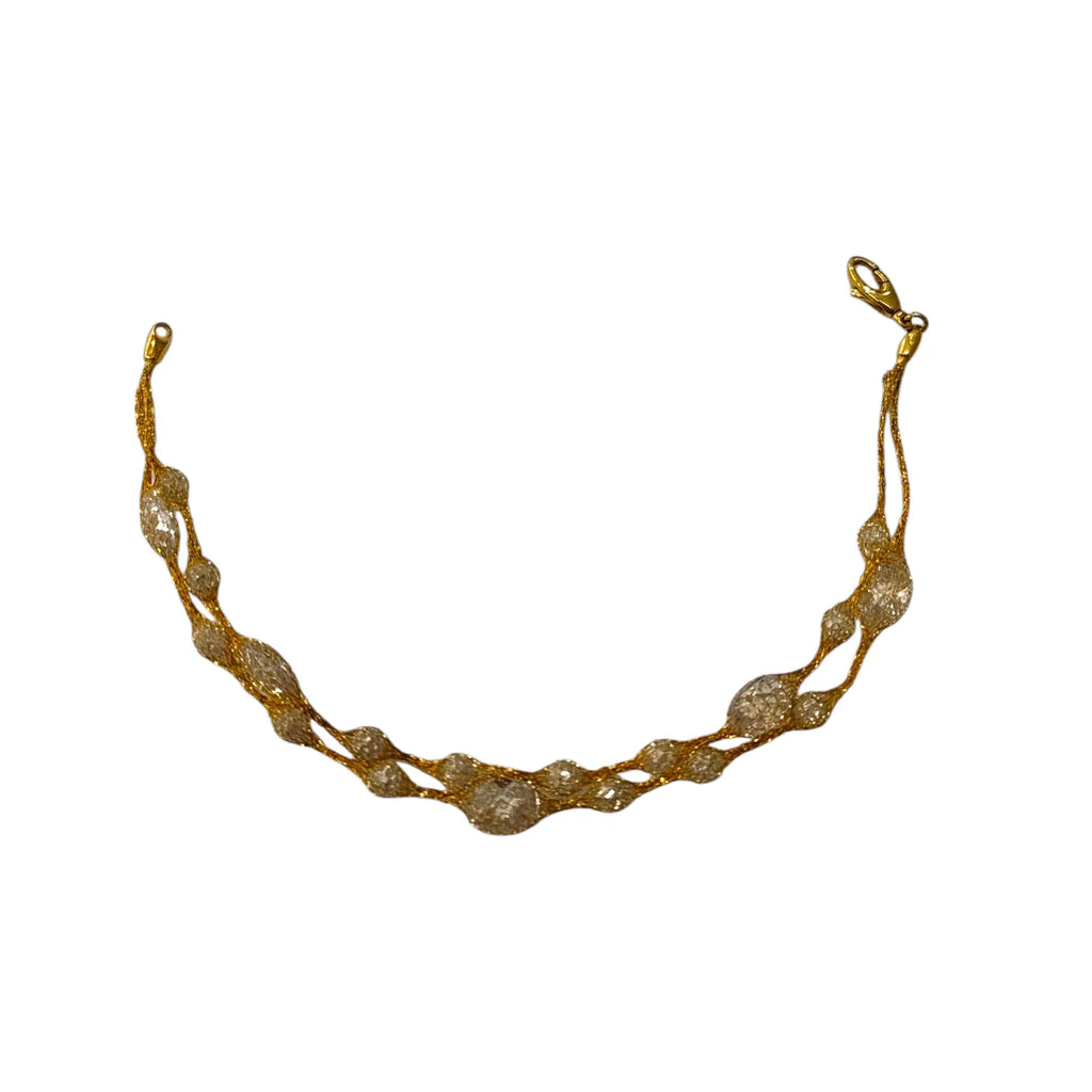 Bracciale donna in oro giallo 18kt effetto seta e pietre