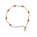 Damenarmband aus 9 kt Gelbgold mit roter Koralle