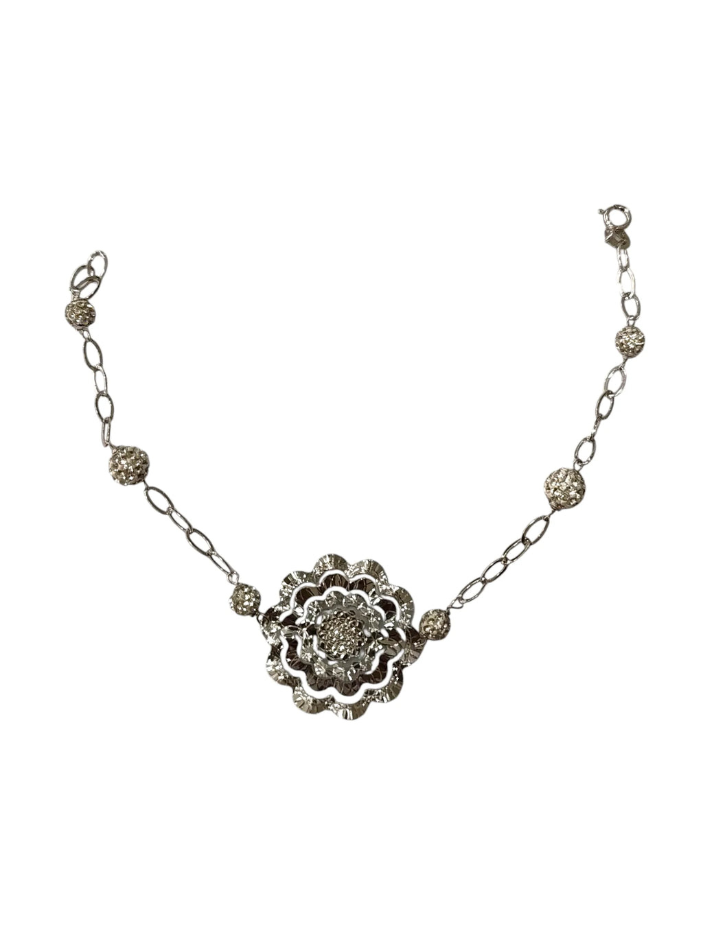 Bracciale donna lavorato in oro bianco con fiore centrale