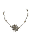 Bracciale donna lavorato in oro bianco con fiore centrale