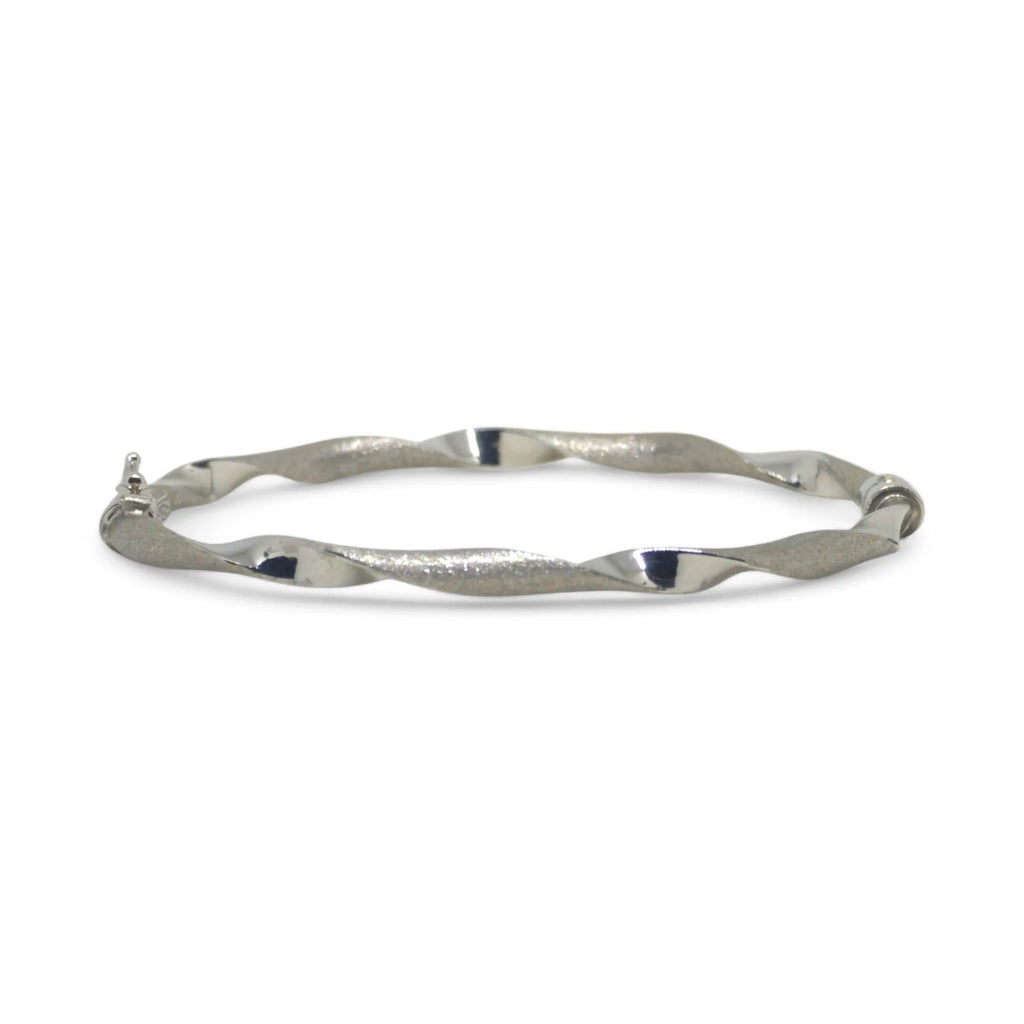 Bracciale donna rigido ondulato elegante in oro bianco 750