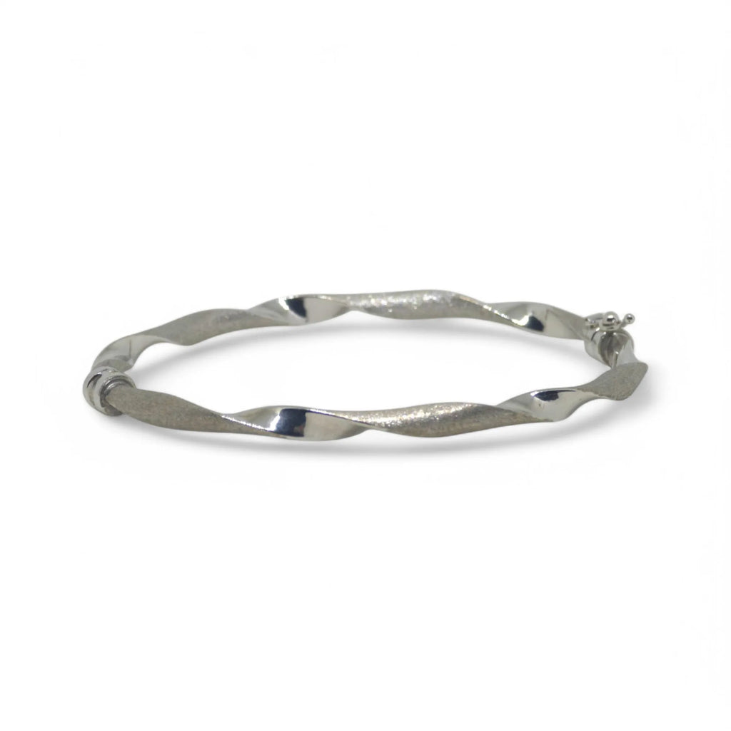 Bracciale donna rigido ondulato elegante in oro bianco 750