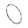 Bracciale donna rigido ondulato elegante in oro bianco 750
