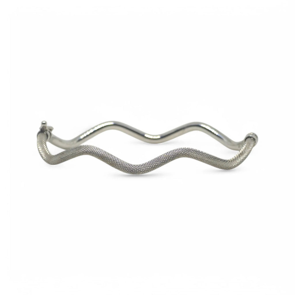 Bracciale donna rigido ondulato in oro bianco 18 kt