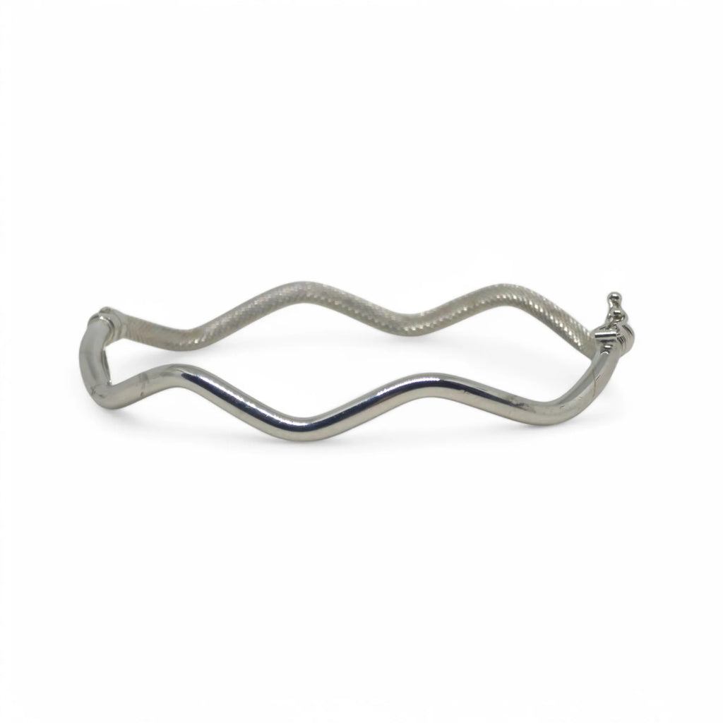 Bracciale donna rigido ondulato in oro bianco 18 kt