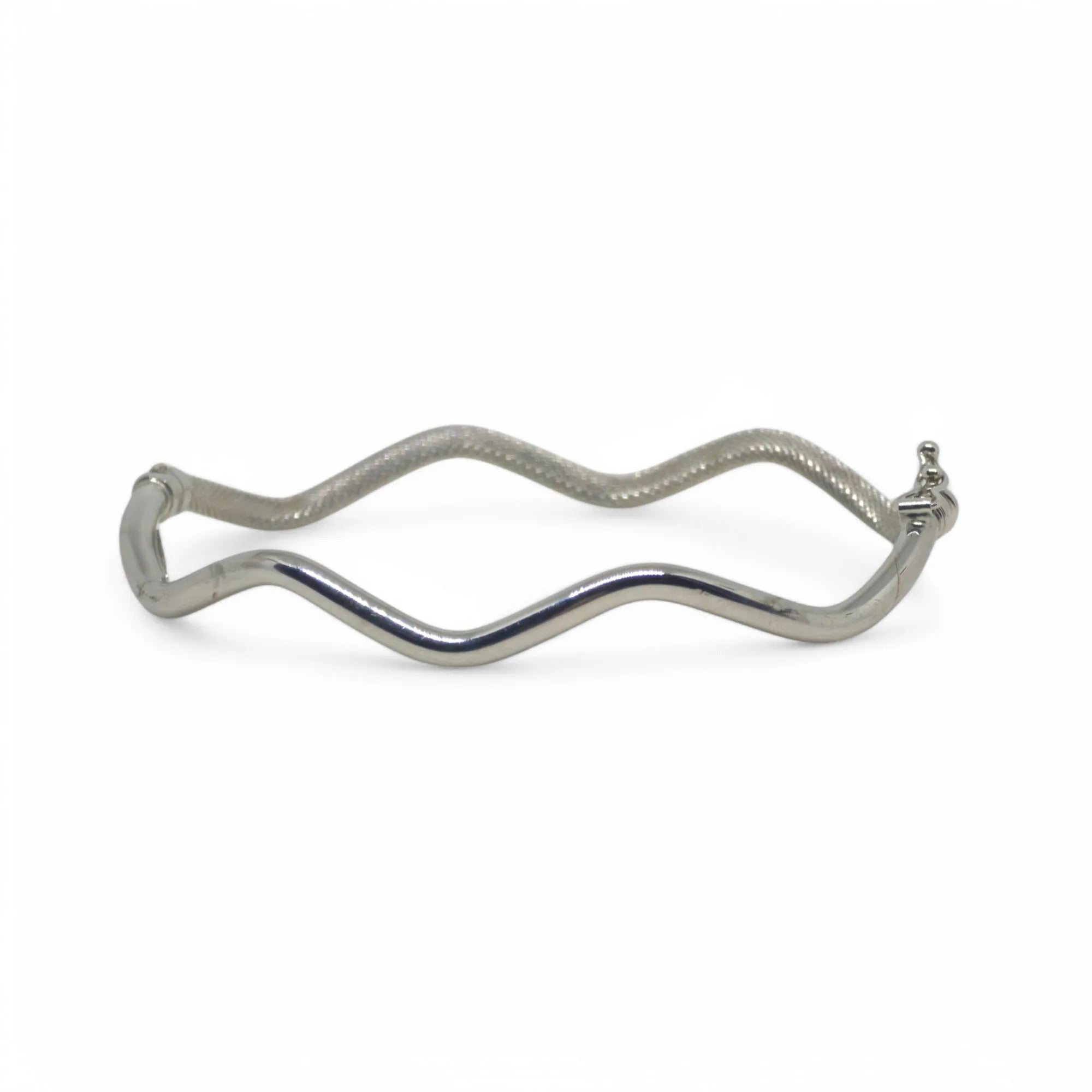 Bracciale donna rigido ondulato in oro bianco 18 kt
