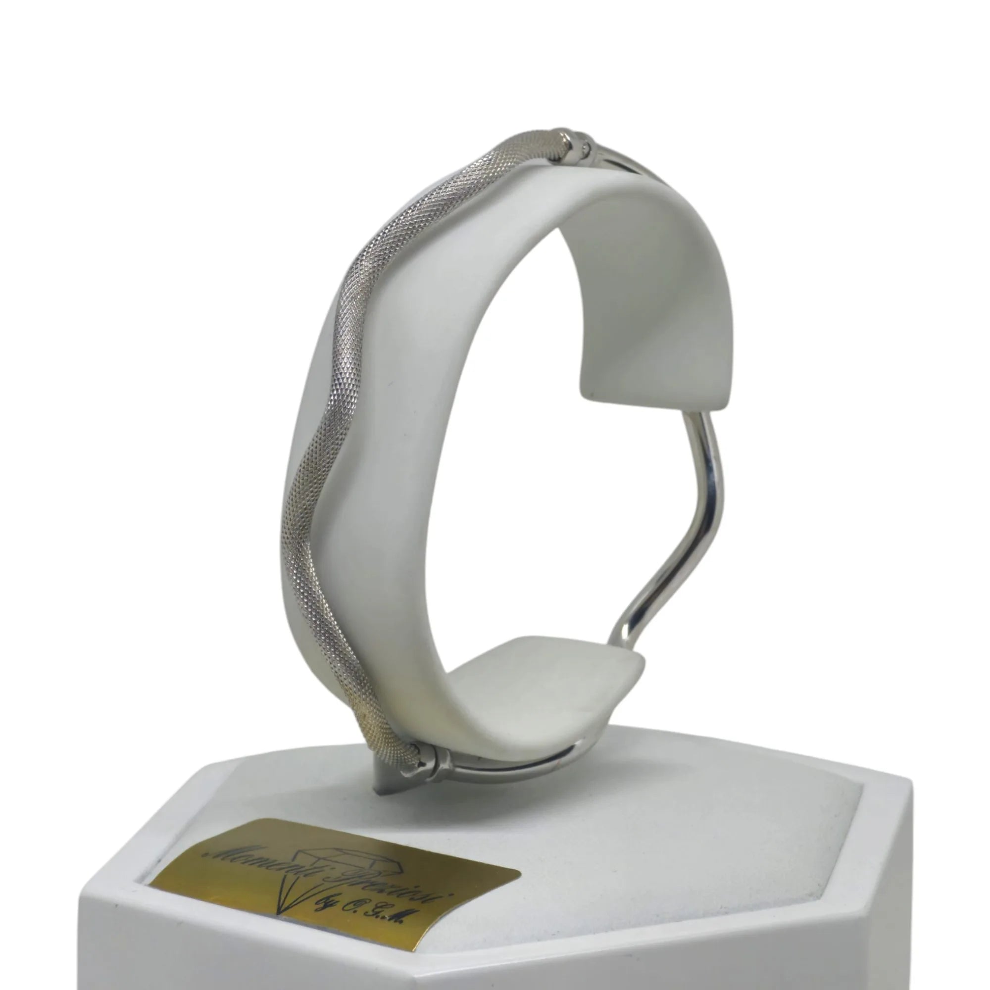 Bracciale donna rigido ondulato in oro bianco 18 kt