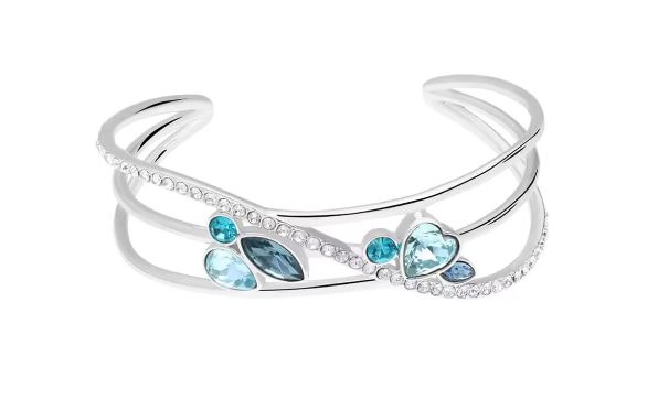 Bracciale rigido largo in metallo rodiato con cuore pietre azzurre e strass 1668609