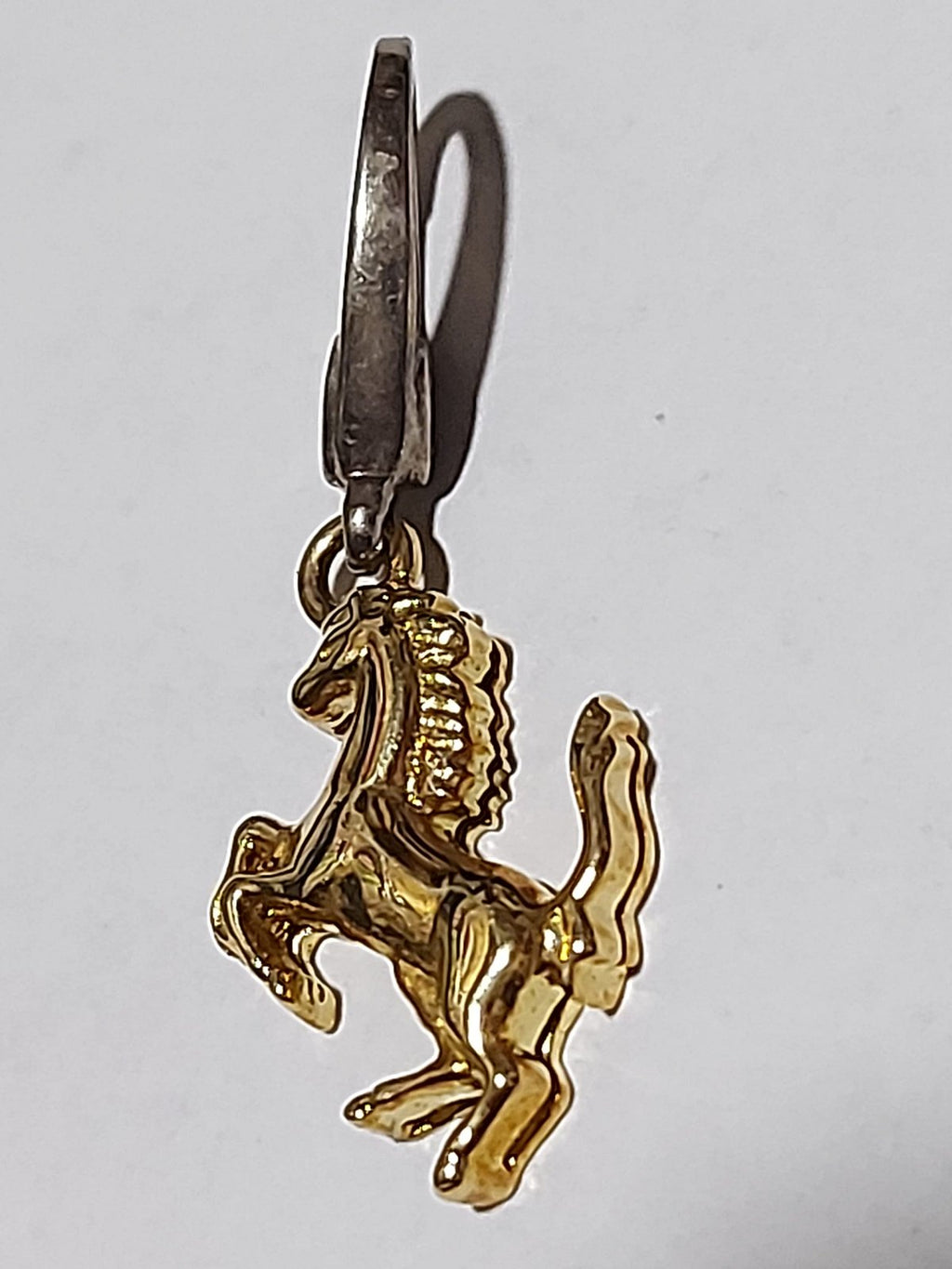 Ciondolo Ferrari uomo cavallo rampante oro 18kt.