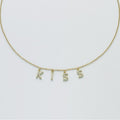 Collana donna Kiara charms scritta kiss in ottone dorato KCLD3883G