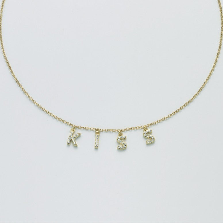 Collana donna Kiara charms scritta kiss in ottone dorato KCLD3883G