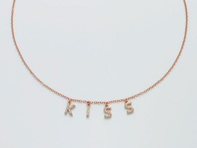 Collana donna Kiara con scritta kiss in ottone rosè e zirconi KCLD3883R