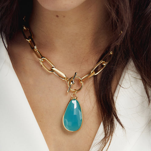 Collana in bronzo dorato con cristallo turchese Unoaerre donna 2037