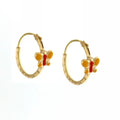 Orecchini donna oro giallo 18 kt Cerchi con farfallina