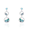 Orecchini pendenti in metallo rodiato con cuore pietre azzurre e strass 1668625