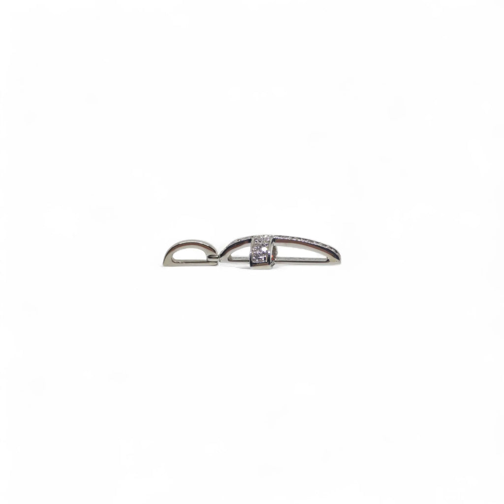 Pendente croce in oro bianco 18 kt e diamanti