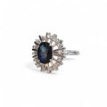 Anello donna zaffiro blu centrale e diamanti laterali in oro 18kt