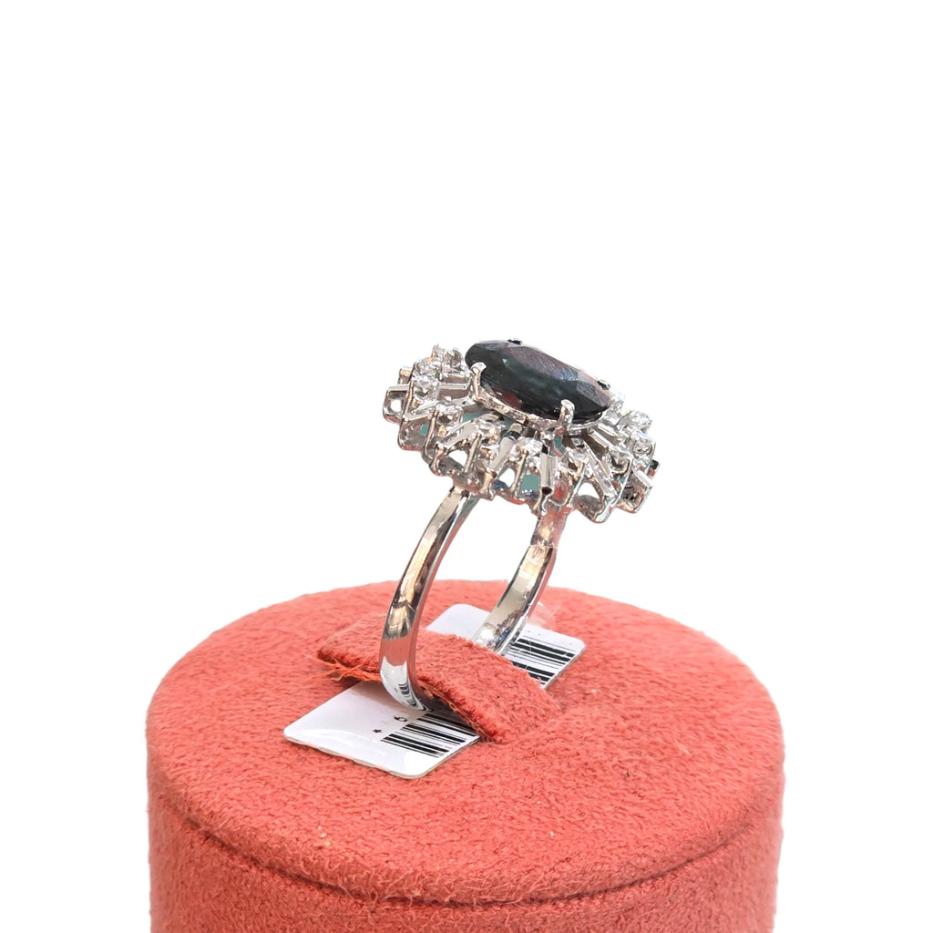 Anello donna zaffiro blu centrale e diamanti laterali in oro 18kt