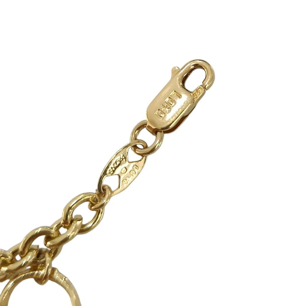 Bracciale donna in oro 18 carati con borsette pendenti