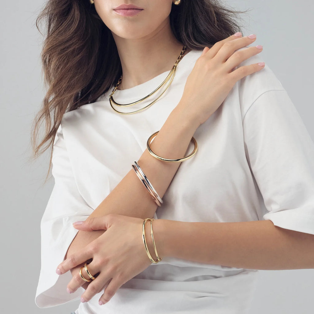 Collana Unoaerre donna rigida in bronzo dorato line 2634