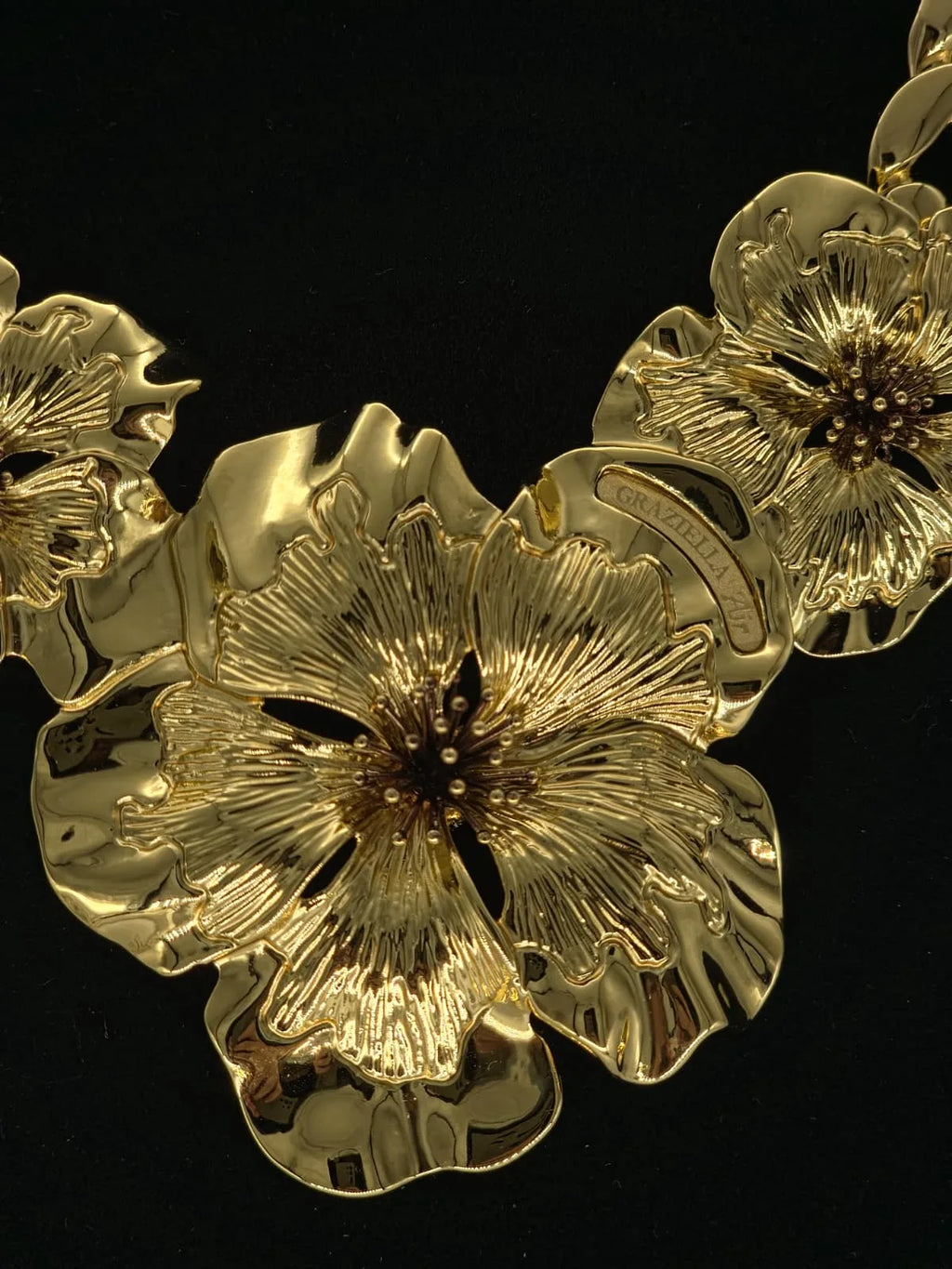 Set fiore piccolo in oro giallo 18 carati